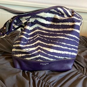 Coach. Zebra printed canvas purple.
